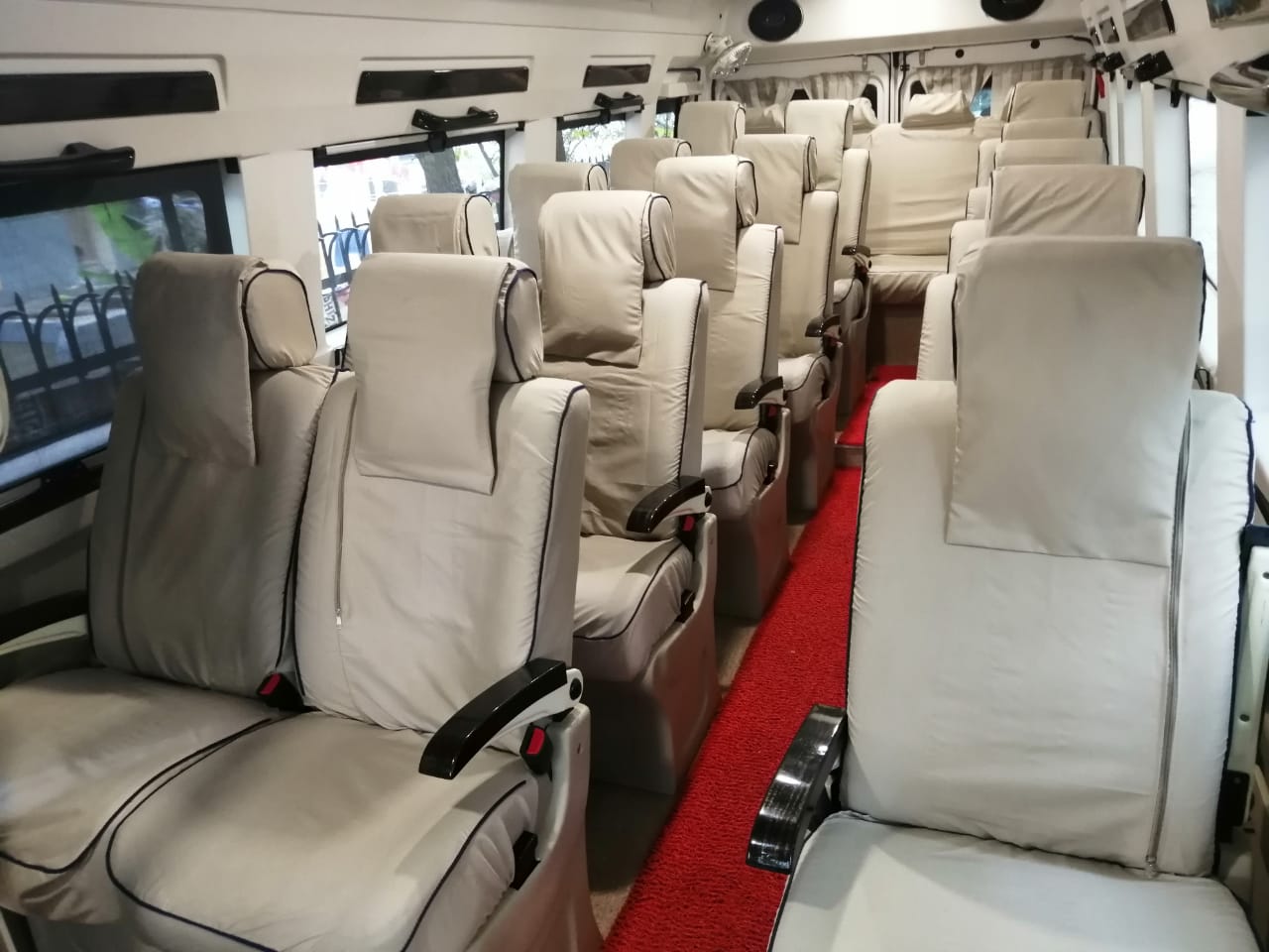 tempo traveller with recliner seats